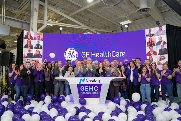 GE HealthCare employees celebrate the ringing of the opening bell for the Nasdaq exchange on January 4